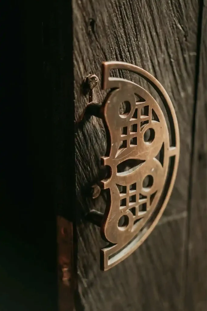 ornate brass door latch detail at Billy Ho modern Japanese restaurant in Canggu